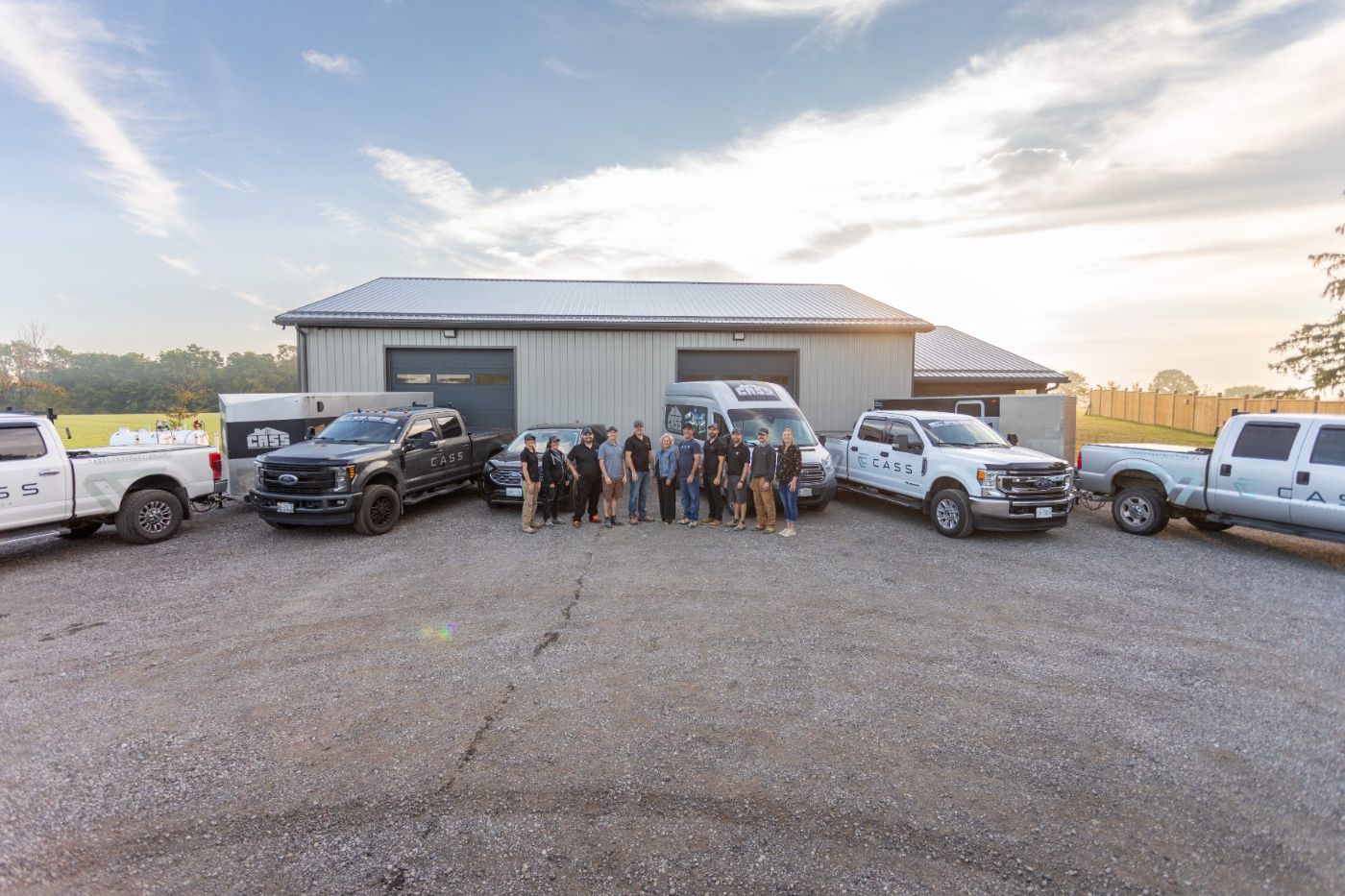 The Cass Construction team and fleet outside the shop in Bright, Ontario