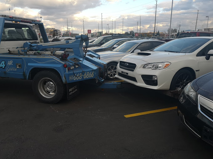Duff's Towing flatbed at work