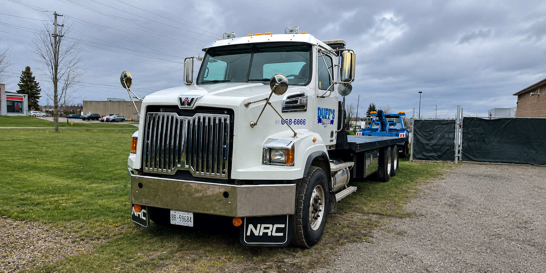 Duff's Towing flatbed at work